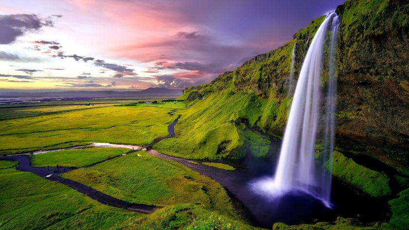 time lapse photography of waterfalls during sunset